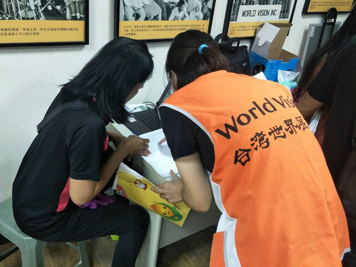 社工關懷受助童