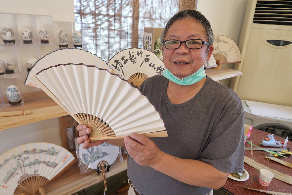 竹扇是黃建達的最愛