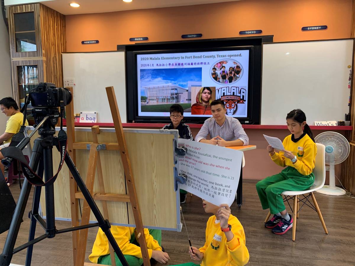 蘆洲區鷺江國民小學與外師一同推廣英語日
