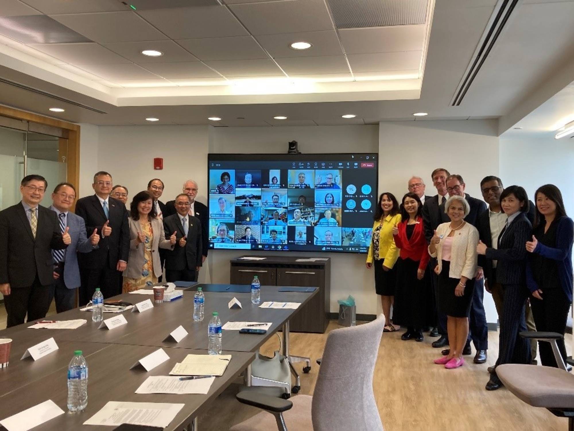 The dignitaries at the signing of the MOU in Chicago, in person and participating online from Taipei