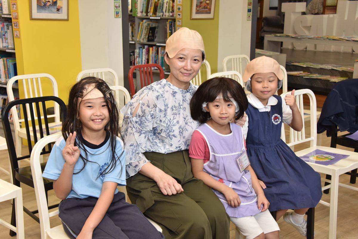 師生戴上光頭與假髮頭套，體會癌友面對落髮的勇氣與不易