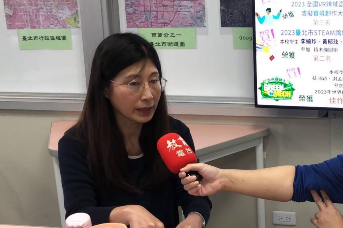 仁愛國中校長周婉玲說明三語課程的推動